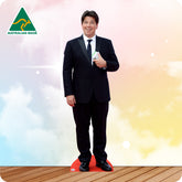 Cardboard standee of a man in a suit with 'Australian Made' logo on a colorful background